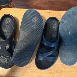 7 pair dawgs sandals various stages of wear. Original solid form $35-45 each.